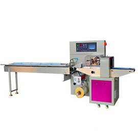 Horizontal flow wrap machine